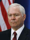 Barack Obama announces Robert Gates will stay on as Secretary of Defence at Chicago press conference on December 1, 2008