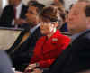 Alaska Governor Sarah Palin listens to Barack Obama at the Governors Association meetings at Congress Hall in Philadelphia on December 2, 2008.