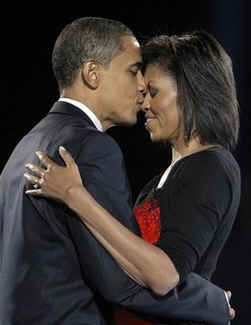Michelle Obama celebrated her 45th birthday aboard the Obama Express train on January 17, 2009, Only 3 days from Obama's Inauguration as President. Photo: Barack kisses Michelle after his historic November 4, 2008 Presidential victory speech in Hyde Park Chicago.