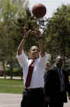 Barack Obama throws a few hoops at Elkhart Indiani Elementary School while on the election campaign. Obama's sports and activities are reflected in photos from the early years to the Presidency.