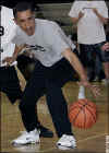 Barack Obama retrieves a loose ball in this undated photo.