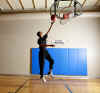 Barack Obama does a solo lay up in this undated photo.