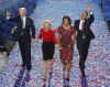 The Obama's and Biden's join on stage at Mile High Stadium at the Democratic National Convention in Denver Colorado on August 28, 2008.