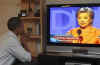 Barack Obama watches Hillary Clinton's speech at the Denver DNC while he is in Billings Montana on August 26, 2008.