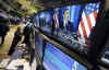 Barack Obama's OMB press conference is broadcast on the floor of the NYSE on November 25, 2008.