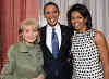 Michelle and Barack Obama pose with Barbara Walters during the taping of an episide of 20/20 on November 26, 2008.