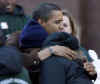 Barack Obama received many hugs at a Chicago school food bank on November 26, 2008.
