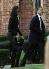 Michelle and Barack Obama arrives at a Chicago church for funeral on November 28, 2008.