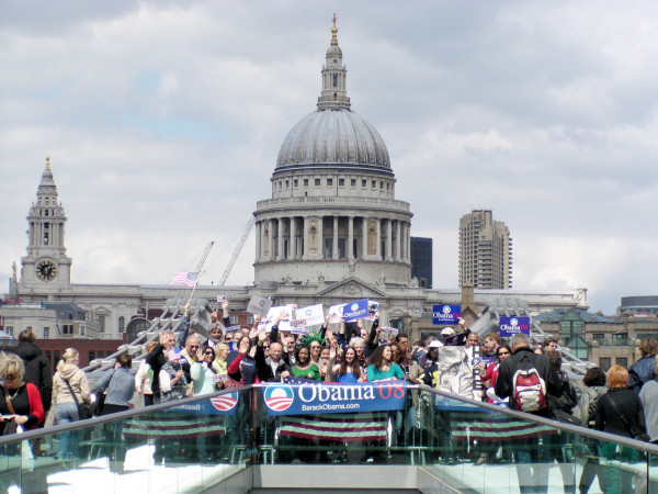 Obama supporters on Millennium Bridge with St. Paul's Cathedral in the background.