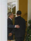 President George W. Bush and President-elect Barack Obama enter the White House on November 10, 2008.)
