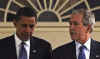 President George W. Bush talks with President-elect Barack Obama at the White House on November 10, 2008.