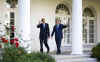 President George W. Bush and President-elect Barack Obama walk in the Collande at the White House on November 10, 2008.