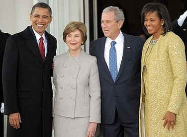 George and Laura Bush meet Michelle and Barack Obama at the North Portico of the White House prior to ceremonies.