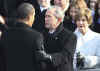 Barack Obama is congratulated by President George W. Bush after oath.