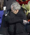 Barack Obama's daughters and President George W. Bush congratulate Obama after his Inaugural speech.