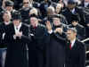 After Barack Obama delivers his Inaugural Address he sings the Star Spangled Banner, then escorts Bush to helicopter.