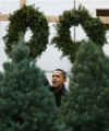 Barack Obama and his two daughters shop for a Christmas tree in Chicago under heavy Secret Service protection on December 14, 2008.