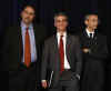 John Podesta, the Co-Chair of Transition Project, Rahm Emanuel, new Chief of Staff, and Obama advisor David Axelrod listen to Barack Obama at Chicago press conference on December 15, 2008.