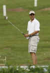 Barack Obama set to practice his golf swing on the driving range at the course near his Kailua, Hawaii vacation home on December 21, 2008.