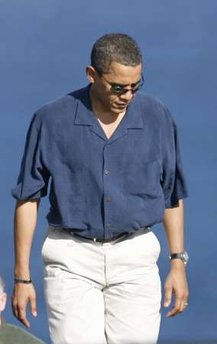 Obama at a seaside memorial ceremony after spreading the ashes of his maternal grandmother, Madelyn Dunham, in Honolulu, on December 23, 2008.