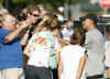 Barack Obama greets the crowd after workout at Semper Fit gym on US Marine Corps Base in Kailua on December 24, 2008.