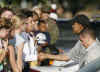 Barack Obama greets the crowd after workout at Semper Fit gym on US Marine Corps Base in Kailua on December 24,