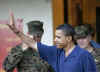 On December 25th Barack Obama waves after surprise visit to the Kailua Marine Corps Base during Christmas dinner.