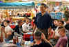 On December 25th Barack Obama pays a surprise visit to the Kailua Marine Corps Base during Christmas dinner.