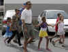On December 26, 2008 Barack Obama and his two daughters go to the Koko Marina mall in Hawaii Kai for lunch and snacks.
