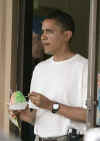 Barack Obama leaves Kokonuts Shaved Ice with treat. On December 26, 2008 Barack Obama's family and friends go to the Koko Marina mall in Hawaii Kai for lunch and snacks.