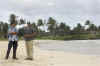 Hawaii police and Secret Service guard Barack Obama's beachfront vacation compound shown in the background on December 27, 2008.