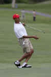Barack Obama leans after a missed  putt on the 18th hole of the Mid Pacific Country Club in Kailua, Hawaii on December 29, 2008.