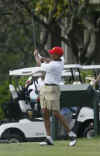 Barack Obama tees off on the tenth hole at the Mid Pacific Country Club in Kailua, Hawaii on December 29, 2008.