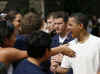 Barack Obama greets the crowd after playing basketball at Punahou School in Honolulu, Hawaii on December 30, 2008. Barack Obama graduated from Honolulu's Punahou School in 1979.