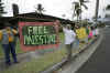 Protesters denouncing Israeli air strikes in Gaza hold "Free Palestine" banner outside Barack Obama's family vacation compound in Hawaii on December 30, 2008.
