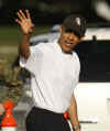 Barack Obama waves to crowd after workout at the Semper Fit gym on the Kaneohe Bay Marine Corps Base in Kailua, Hawaii on December 31, 2008.
