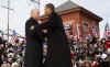 Barack Obama greets Joe Biden in Wilmington, VA enroute to Washington via the Obama Express train on January 17, 2009.