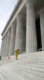 A worker cleans the steps of the Lincoln Memorial in preparation for the inauguration of President Barack Obama. 