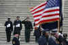 Military personnel on the East Front steps of the Capitol Building are used as stand-ins for Barack and Michelle Obama in a full dress rehearsal of the 56th inauguration..