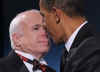 Barack Obama speaks with John McCain at the bipartisan dinner in honor of Senator John McCain. Barack and Michelle Obama do their pre-inauguration duties the day before Obama's inauguration.