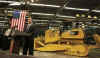 President Barack Obama meets with the CEO of Caterpillar and speaks to the employees of the Caterpillar plant in East Peoria on February 12, 2009.