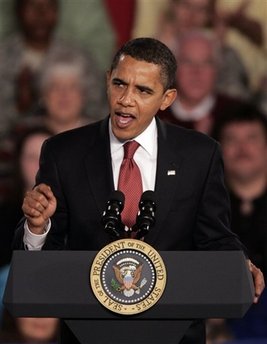 President Barack Obama speaks then answers questions from the audience at a town hall style meeting at Concord Community High School in Elkhart, Indiana. Questions were focused on the economy and the President's stimulus package.