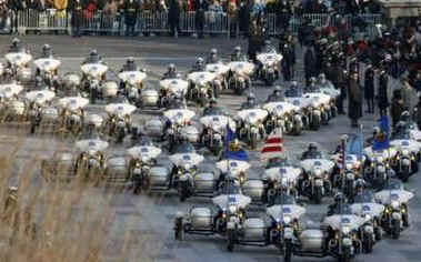 A Police Motorcycle Escort Group rumbles down the parade route as the Inaugural Parade proceeds to the White House.