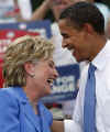 Hillary Clinton and Barack Obama share a laugh at a Democratic Presidential Candidate campaign event in Unity, NH on June 27, 2008.