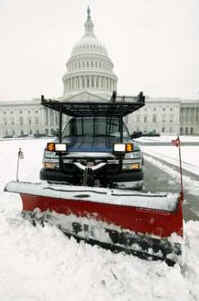 Snow removal on the grounds of the Capitol on a snowy day in Washington on January 27, 2009.