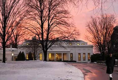 The sun sets on the White House after Day 9 of Barack Obama's presidency.