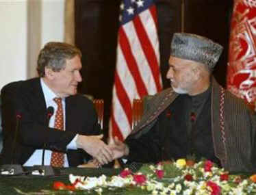 Richard Holbrooke, the US Special Envoy to India, Pakistan, and Afghanistan meets with Afghanistan's Afghan President Hamid Karzai in Kabul, Afghanistan on February 14, 2009. 