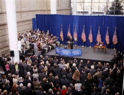President Obama and Vice President Biden speak at the Denver Museum of Science and Nature before signing stimulus bill.