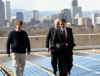 Obama views solar panels on the roof of the Denver Museum of Science and Nature with Biden and Namaste Solar CEO.
