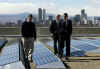Obama views solar panels on the roof of the Denver Museum of Science and Nature with Biden and Namaste Solar CEO.